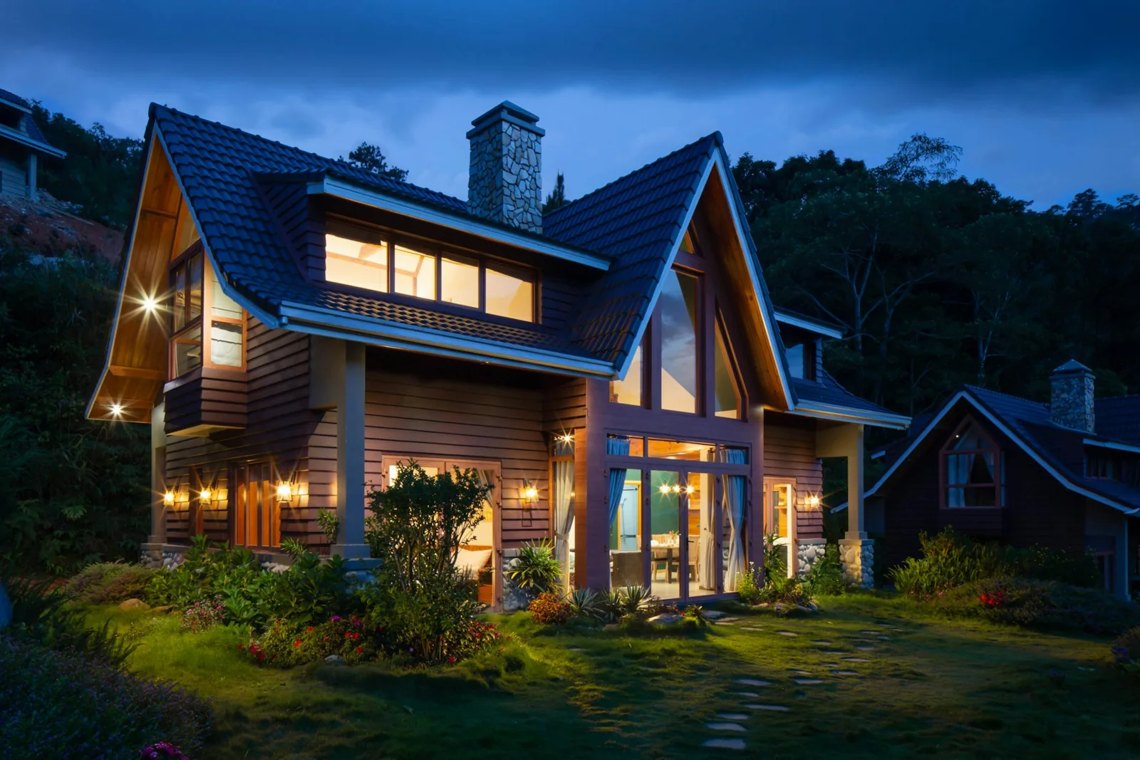 Warmly lit residential architecture at dusk